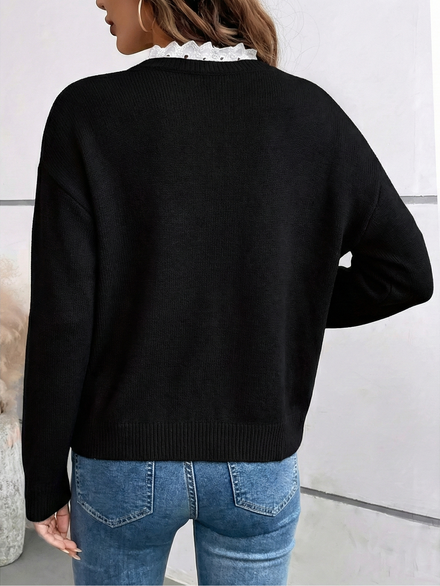 Céline | Elegante jersey de punto con cuello de encaje