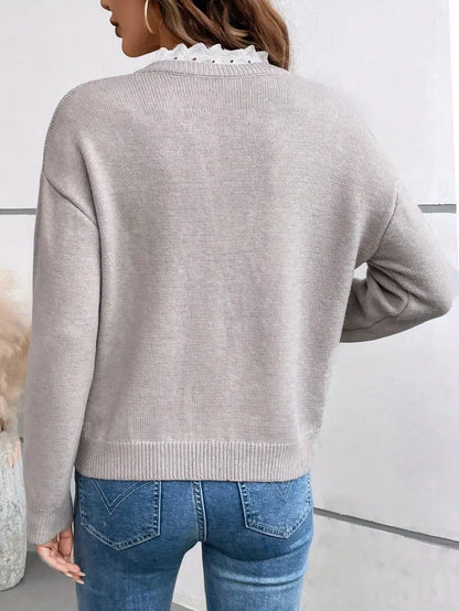 Céline | Elegante jersey de punto con cuello de encaje